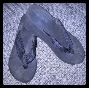 Black platform flip flop sandals
